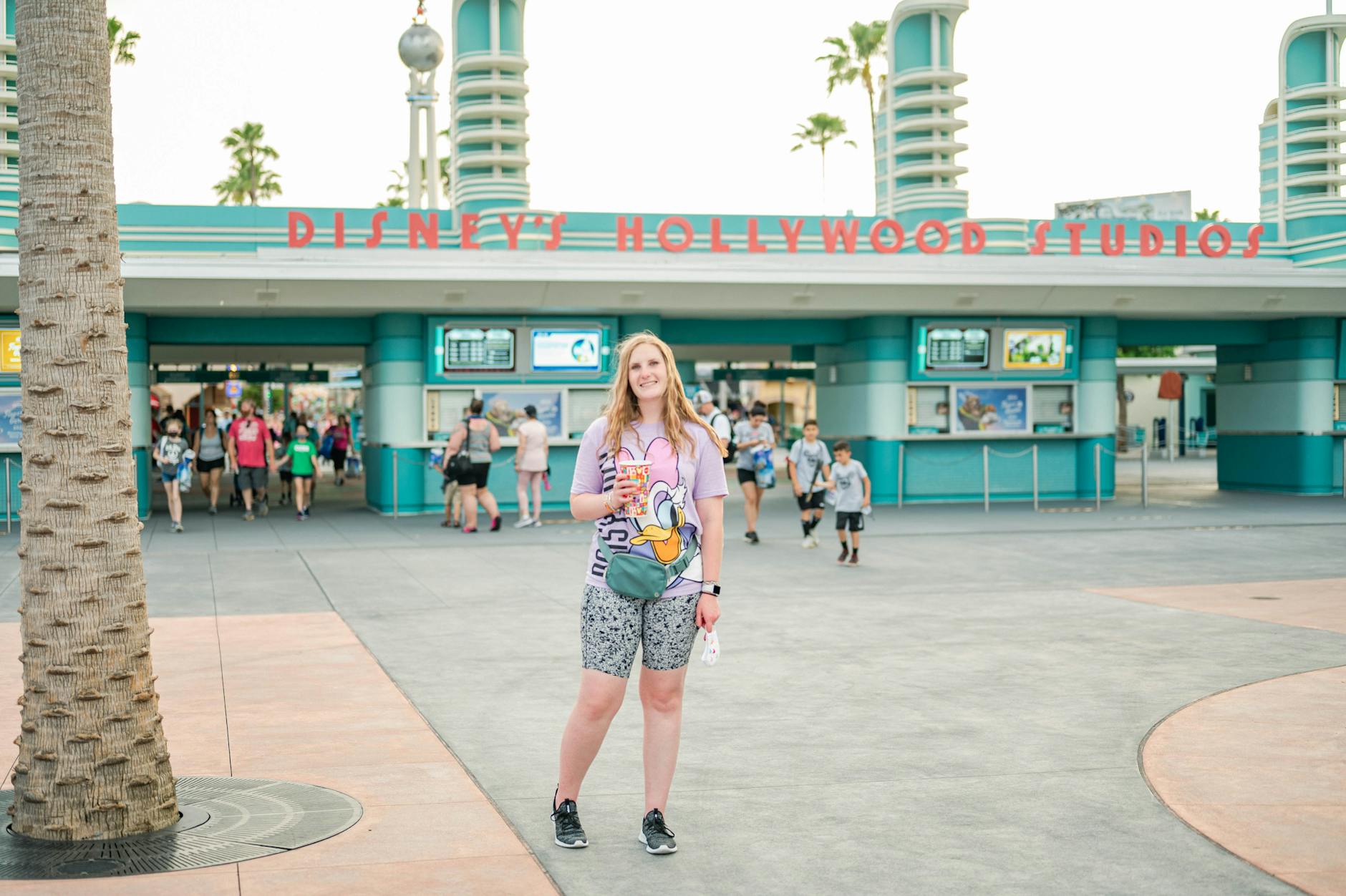 Best Places To Travel In California: Complete All Requirements For Making Plans For Your Next Adventure 5 woman standing in front of a blue building